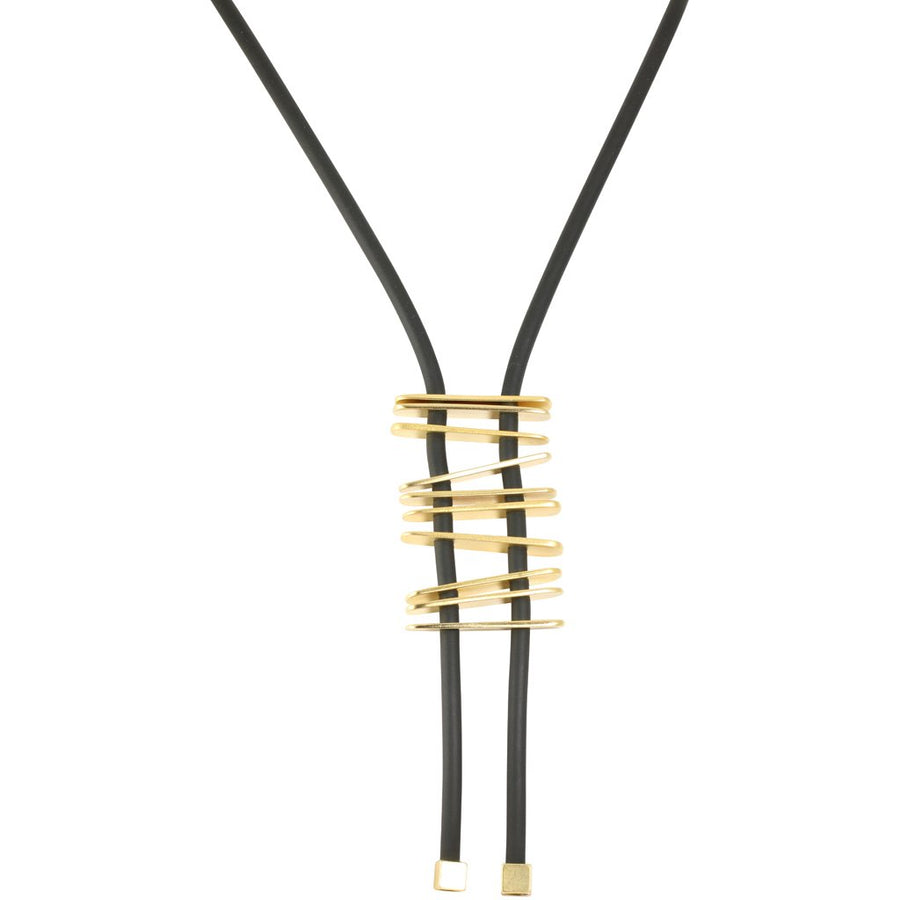 Picture of the The stunning unique bold piece made of rubber and gold bars. stunning !