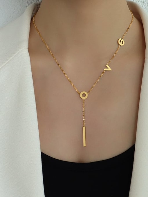 Necklace with space out letters stating L O V E